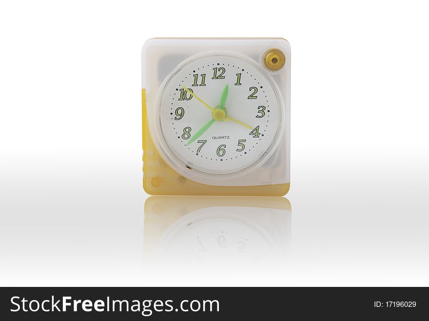 Quartz alarm clock on white background.