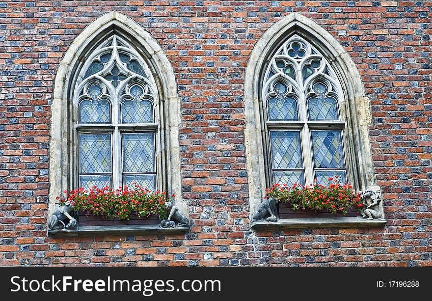 Beautiful portal windows and red bricks - architecture detail, made in Wroclaw