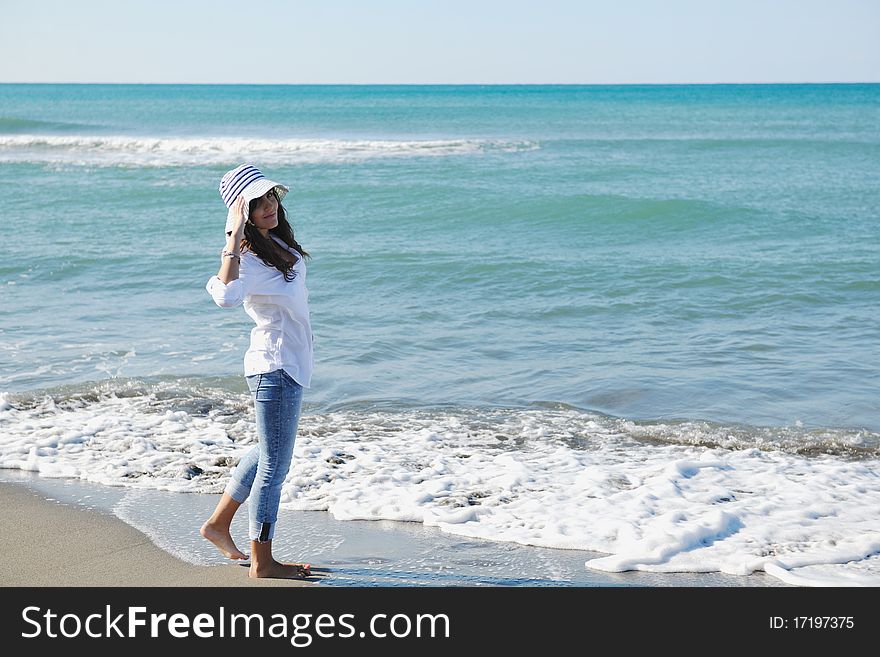 Happy young woman relax onbeautiful beach at morning. Happy young woman relax onbeautiful beach at morning