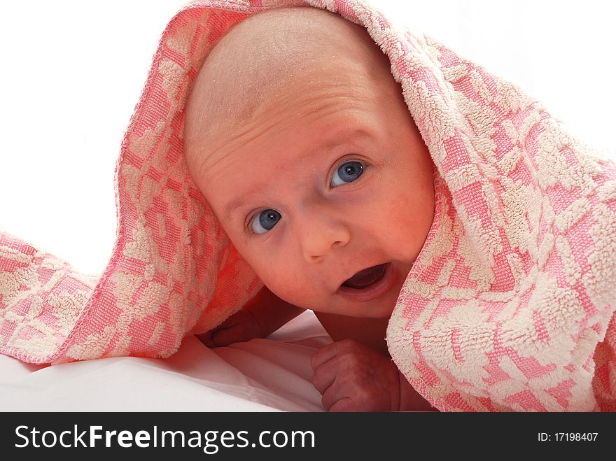 The small newborn child on a white background