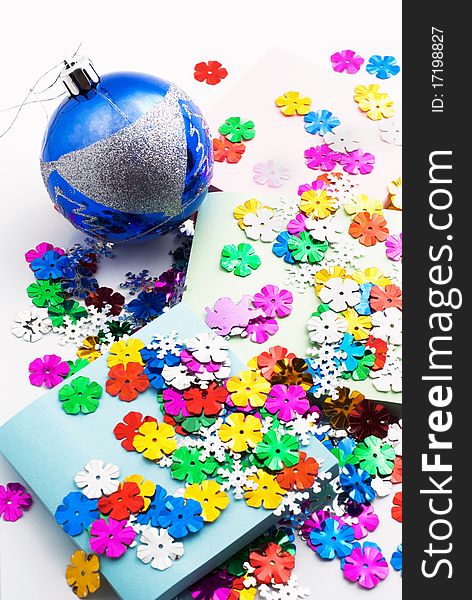 Confetti, Christmas toy and office paper, white background