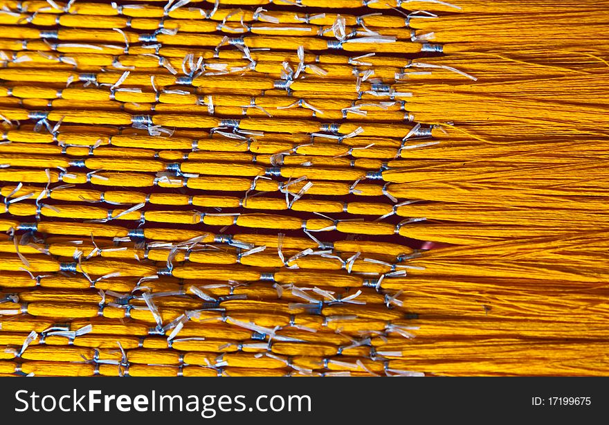 Yellow natural Thai silk thread is preparing to dye by chemical colour in origin traditional knowledge. Yellow natural Thai silk thread is preparing to dye by chemical colour in origin traditional knowledge.