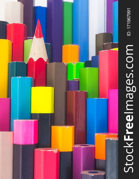 Colorful background of stacked wooden pencil