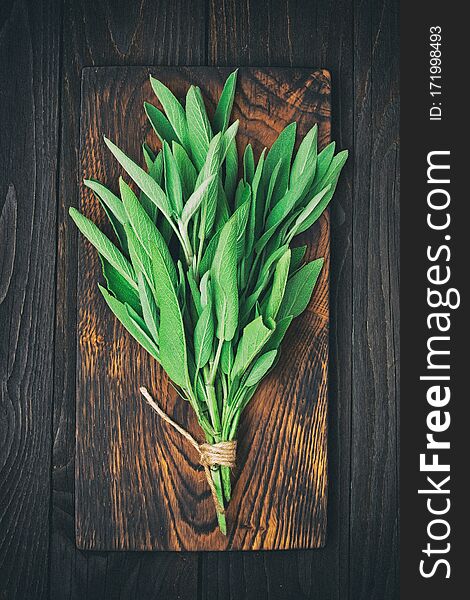 Fresh  sage leaves  on  rustic old  table