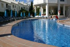 Person Diving Into A Swimming Pool Stock Photo Person Diving Into A Swimming Pool Stock Photo