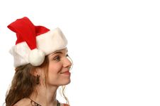 Pretty Blonde Lady Smiling In Santa Hat Royalty Free Stock Photo