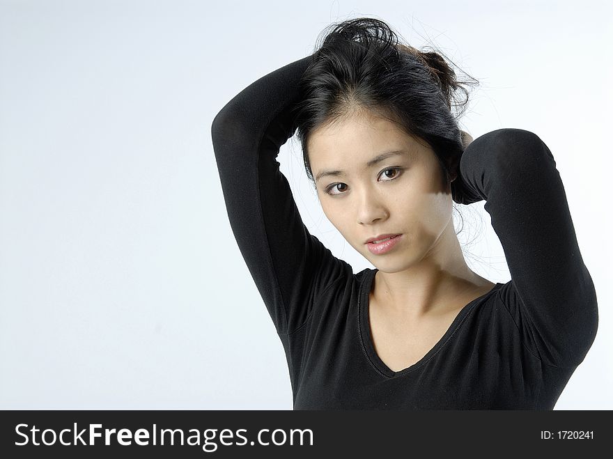 Studio portrait of an asian girl. Studio portrait of an asian girl