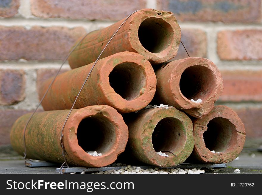 Old disused drain pipes made as to dislpay a piece of art.