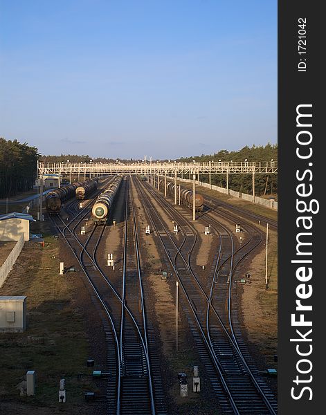 Freight train station with several cargo trains in. Freight train station with several cargo trains in