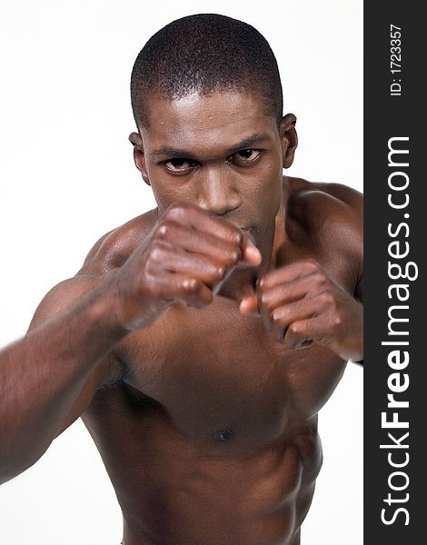 Muscular african american Athelete portrait in a boxing position. Muscular african american Athelete portrait in a boxing position
