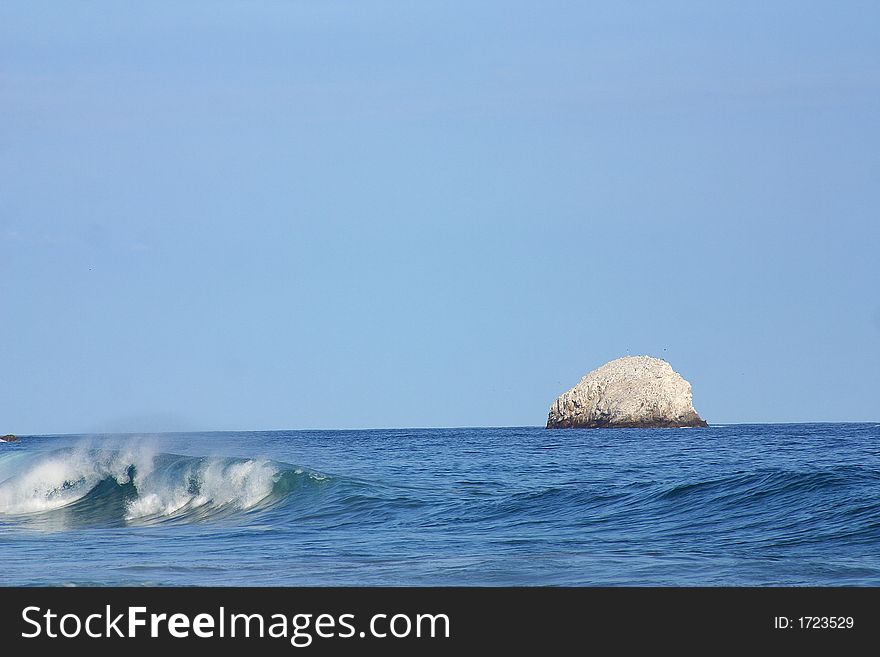 Partial view of the bay of San Agustinillo in the southern state of Oaxaca in Mexico, Latinamerica. Partial view of the bay of San Agustinillo in the southern state of Oaxaca in Mexico, Latinamerica