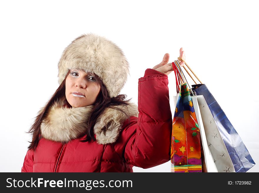 Attractive woman with shopping bags on white background. Attractive woman with shopping bags on white background