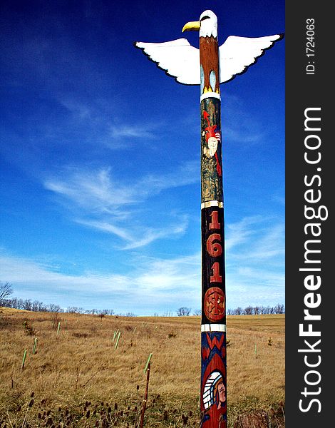 Boy Scout totem pole against the sky. Boy Scout totem pole against the sky