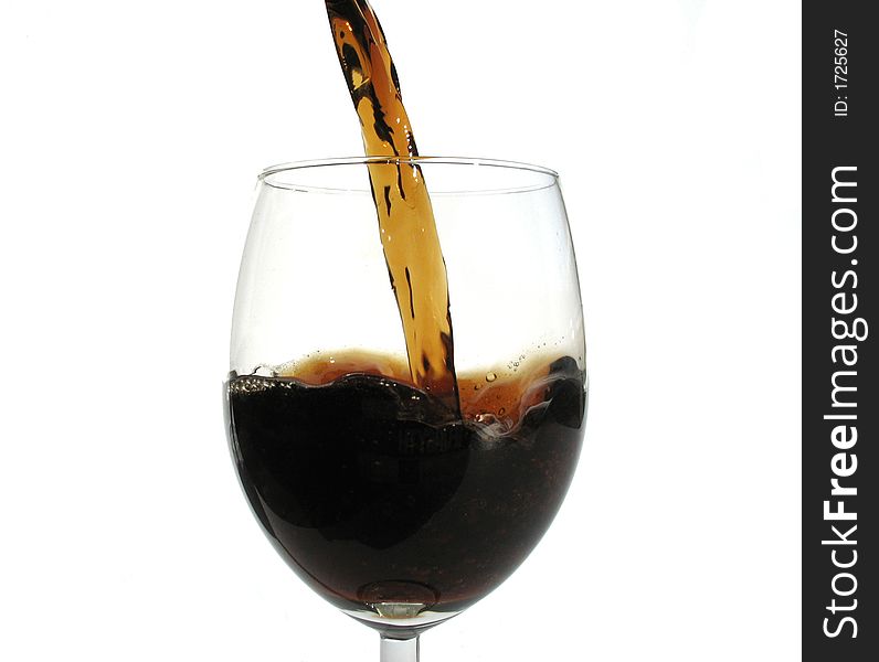 Cola pouring in a glass. Cola pouring in a glass