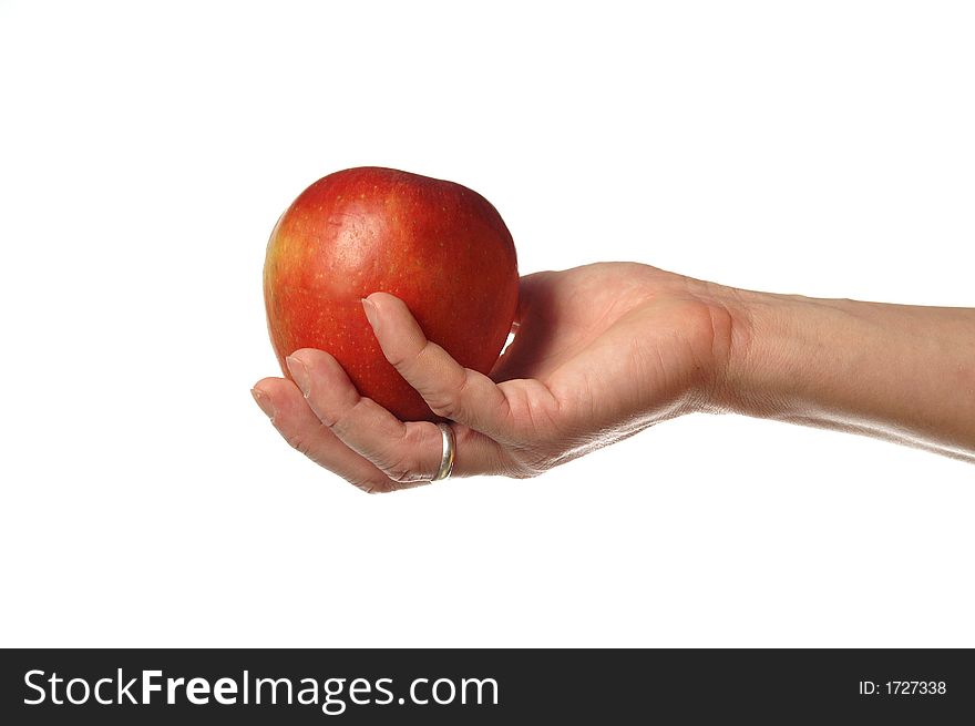 An apple on the hand. An apple on the hand.