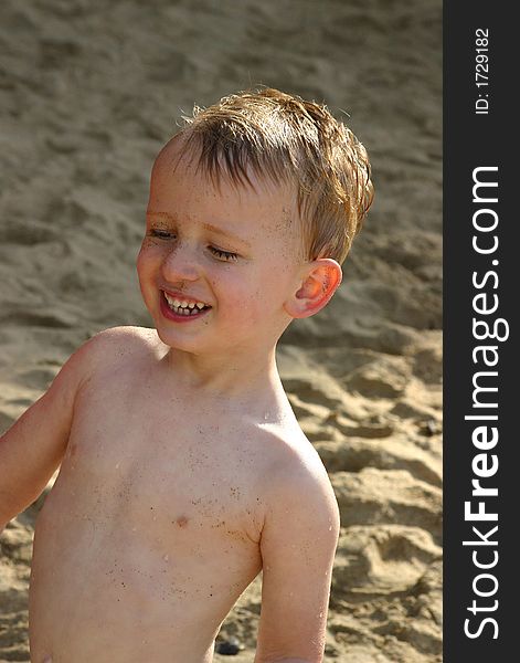 Portrait of a toddler boy enjoying a day on the beach. Portrait of a toddler boy enjoying a day on the beach