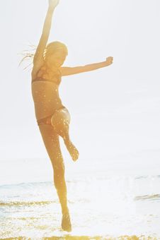 Girl Running In The Sea Stock Photography