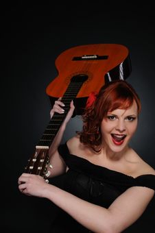 Redhead Woman With Guitar Royalty Free Stock Image Redhead Woman With Guitar Royalty Free Stock Image