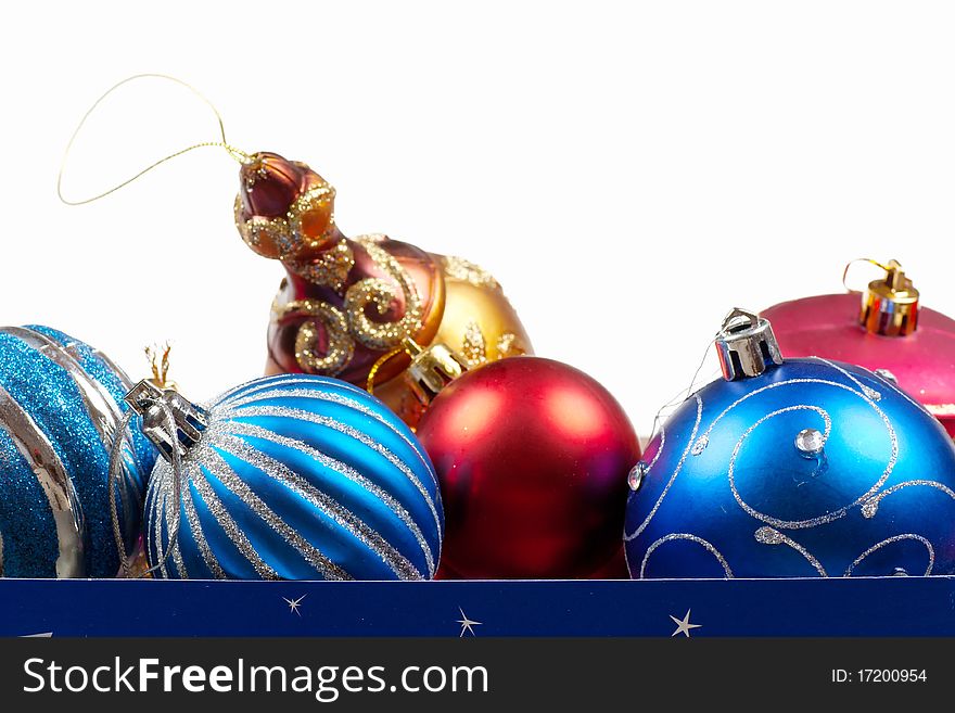 Colorful christmas decorations in a box