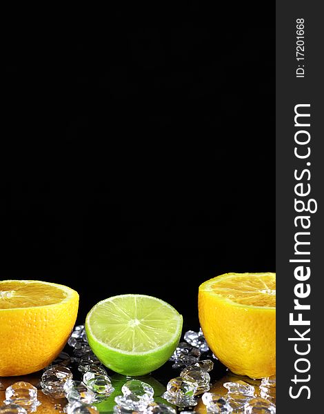 Two orange and lime on a black background