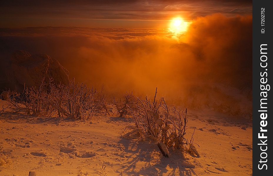 Sunrise in the winter morning -  above clouds.