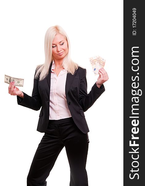 Woman holding euro in one hand and dollars in ano