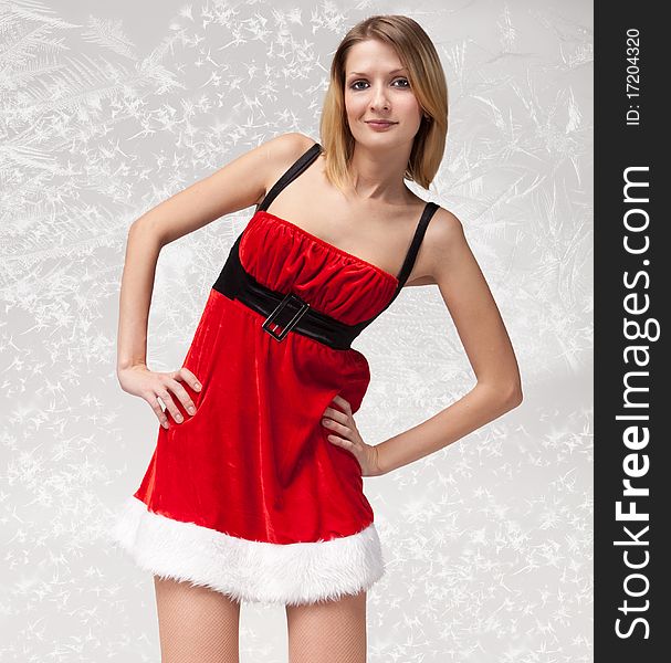 Christmas girl in santa claus clothes