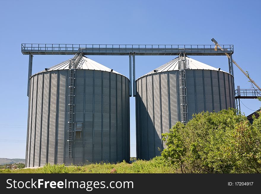 Storage silos for agricultural products, in the countyside. Storage silos for agricultural products, in the countyside