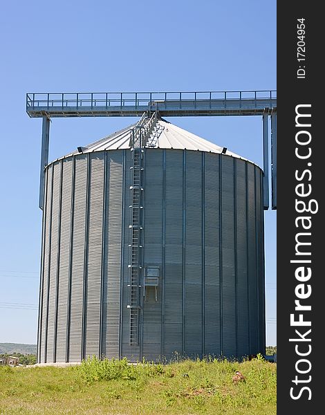 Storage silos for agricultural products, in the countyside. Storage silos for agricultural products, in the countyside