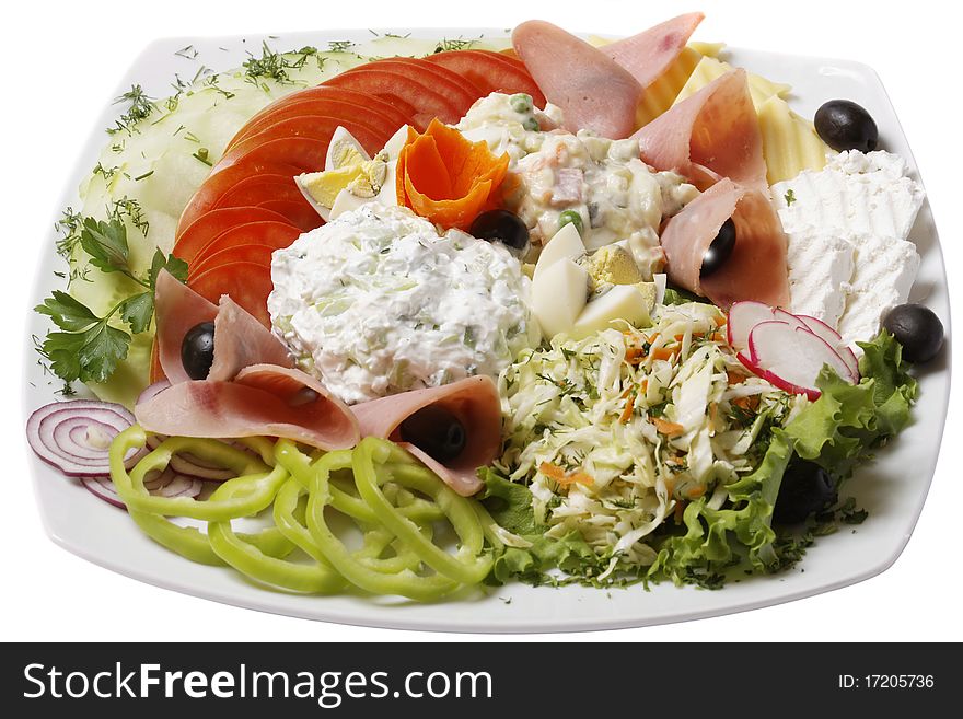 Appetizing bulgarian salad on a plate. Close up. Isolated white