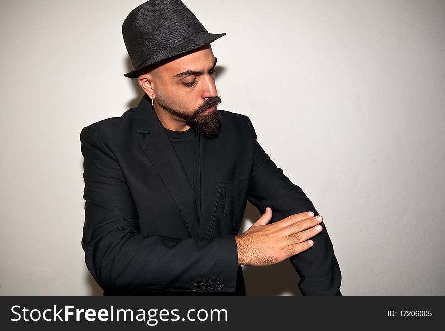 Man with black jacket cleans on white background