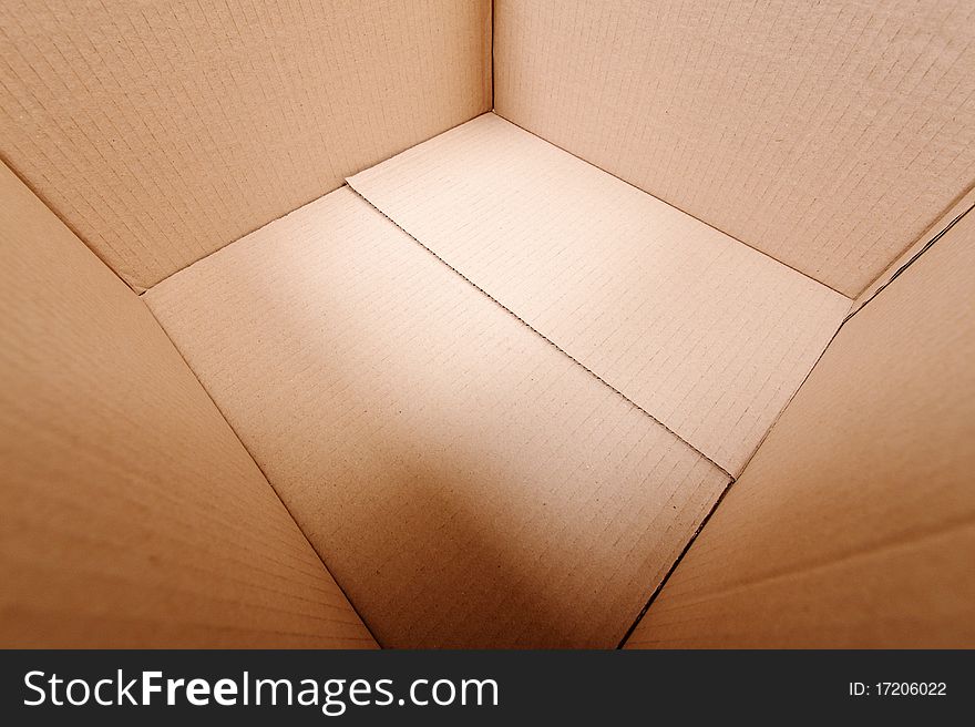 Open cardboard box closeup shot