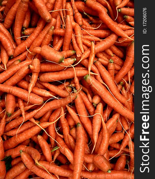 Bunch of Heirloom Carrots at a Farmer's Market. Bunch of Heirloom Carrots at a Farmer's Market