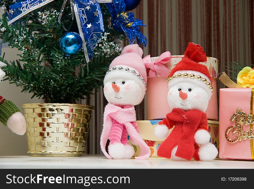 Christmas snow man with gifts,home related