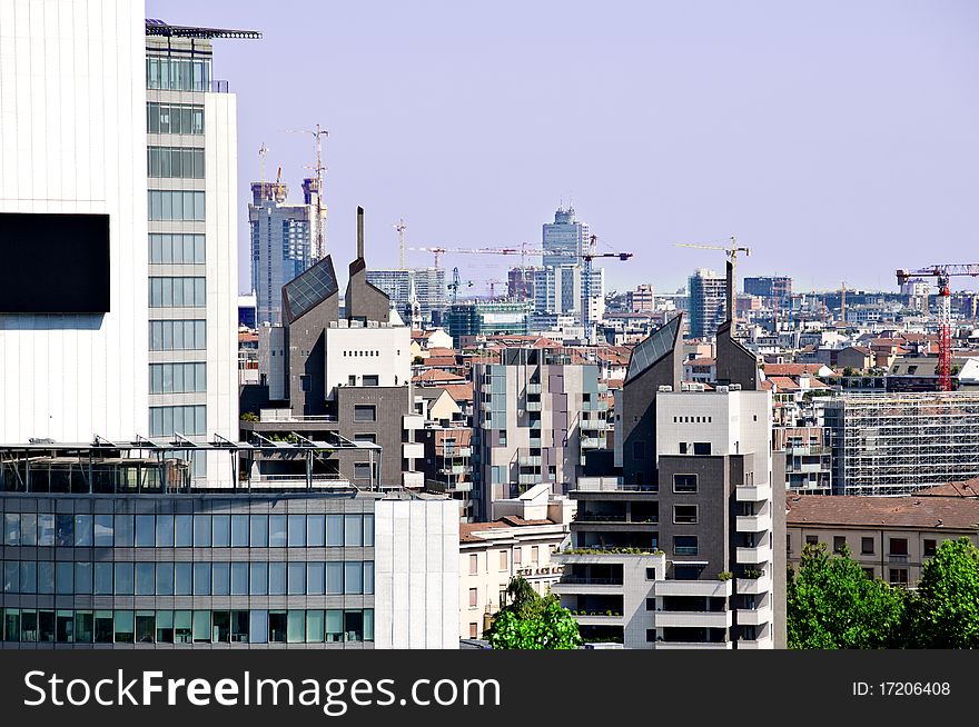 View of skyscrapers and buildings of the city of Milano from the top