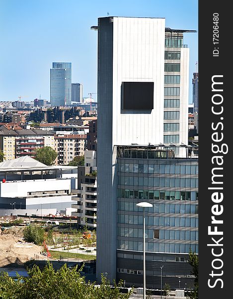 View of skyscrapers and buildings of the city of Milano from the top