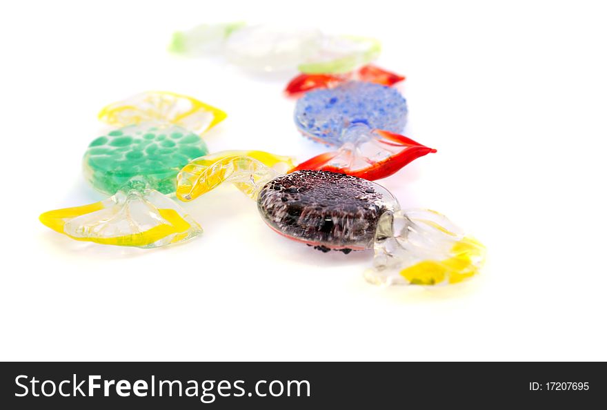 Glass candies isolated on white background.