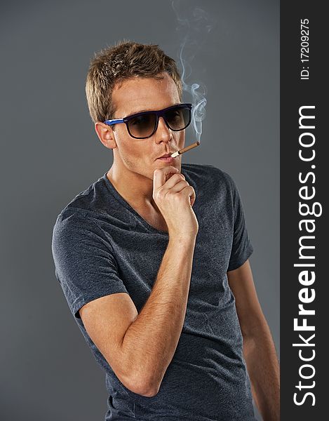 Young Stylish Man Smoking