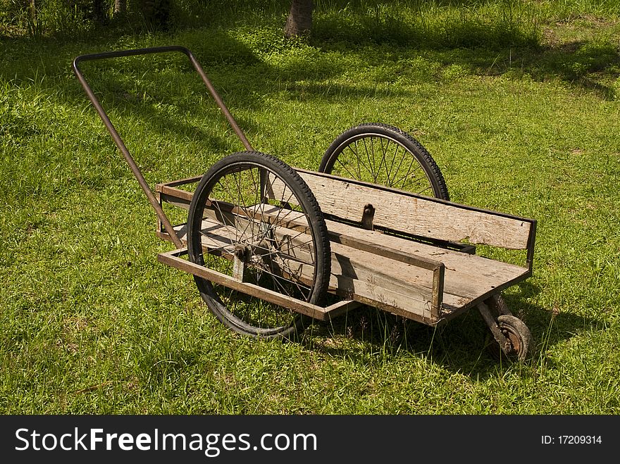 Wooden wheelbarrow or pushcart used by Thai Farmers