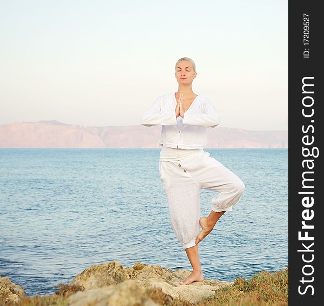 Beautiful Young Woman Doing Yoga Exercise