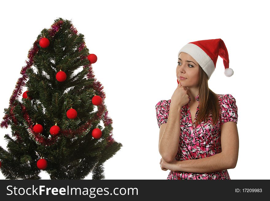 Woman decorate a christmas tree