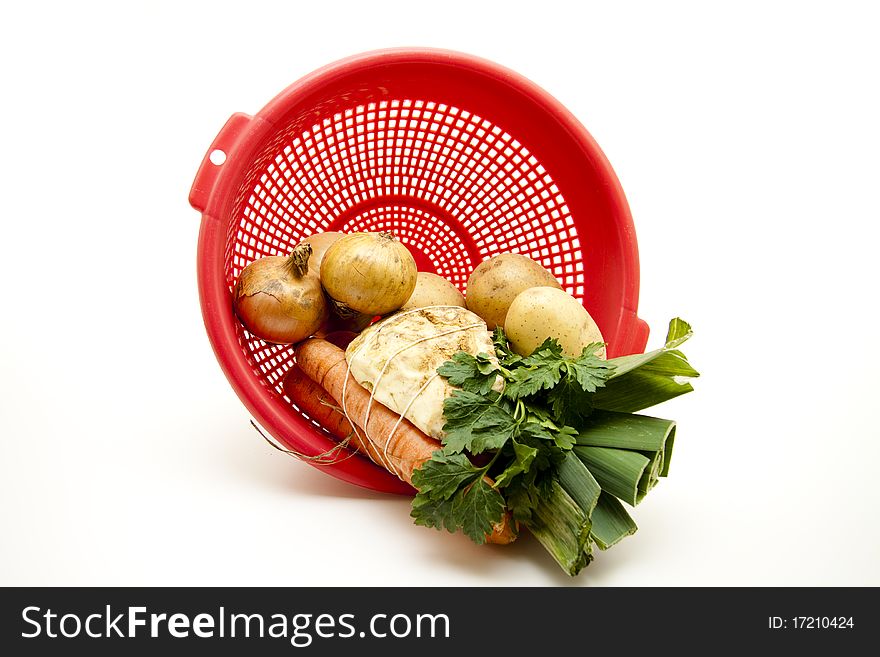 Soup vegetable with potato and onion in the kitchen sieve. Soup vegetable with potato and onion in the kitchen sieve