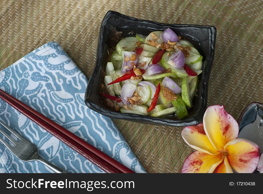 Thai cucumber salsa as accompaniment to Thai fishcakes