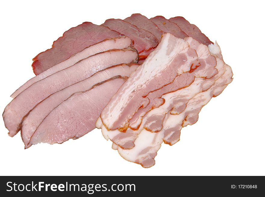 Meat cutting from a boiled pork and bacon on a white background