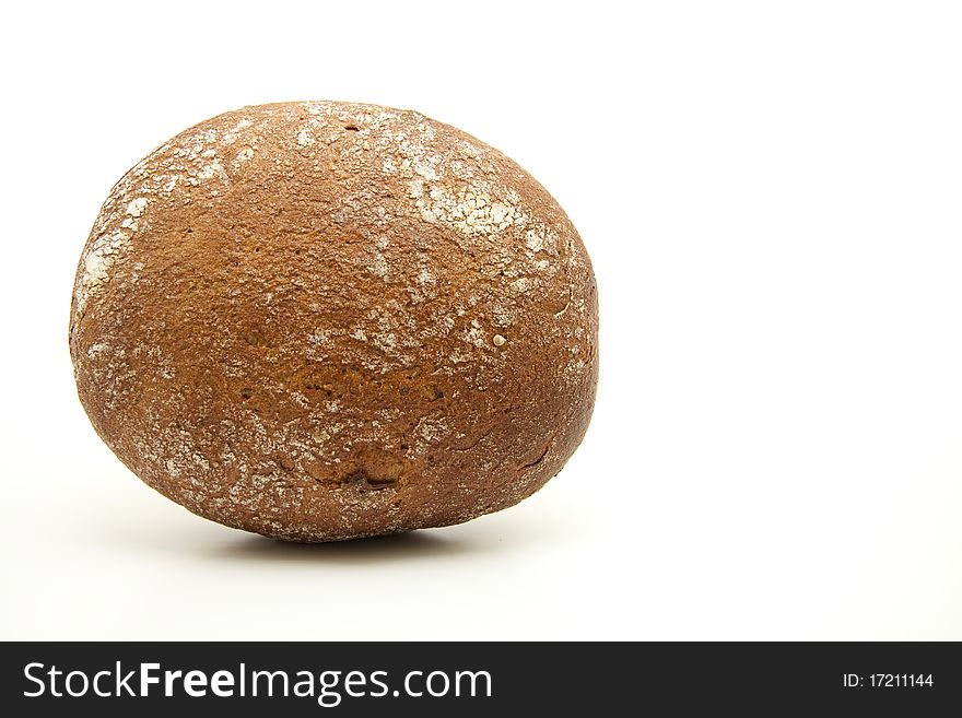 Round wheat bread onto white background. Round wheat bread onto white background