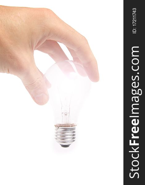 Glowing bulb in the hand isolated on white