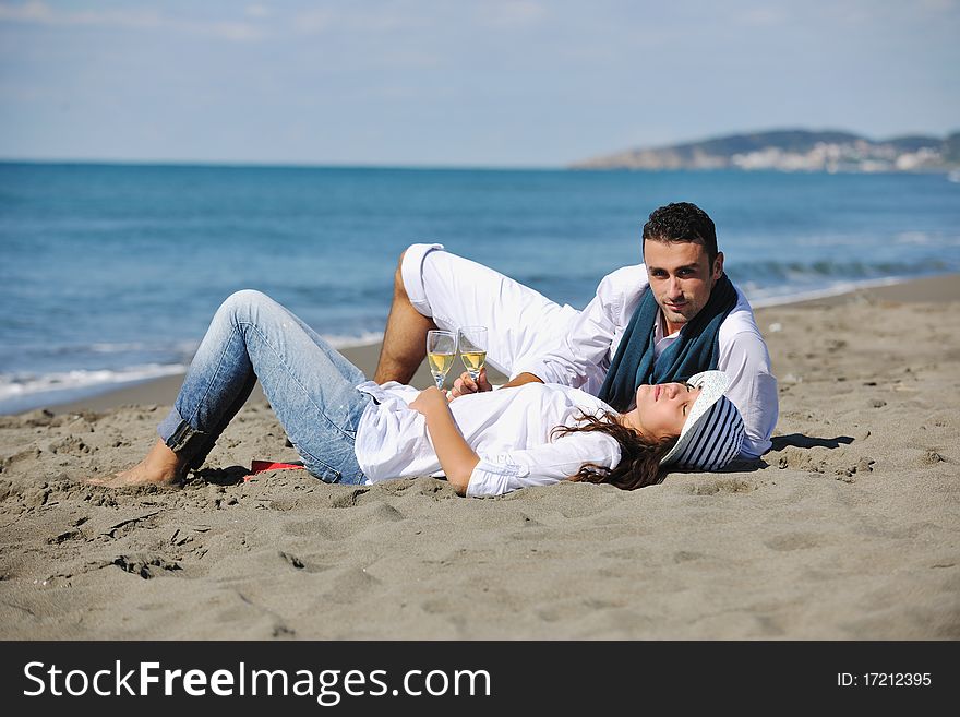 Happy young couple have fun at beautiful beach