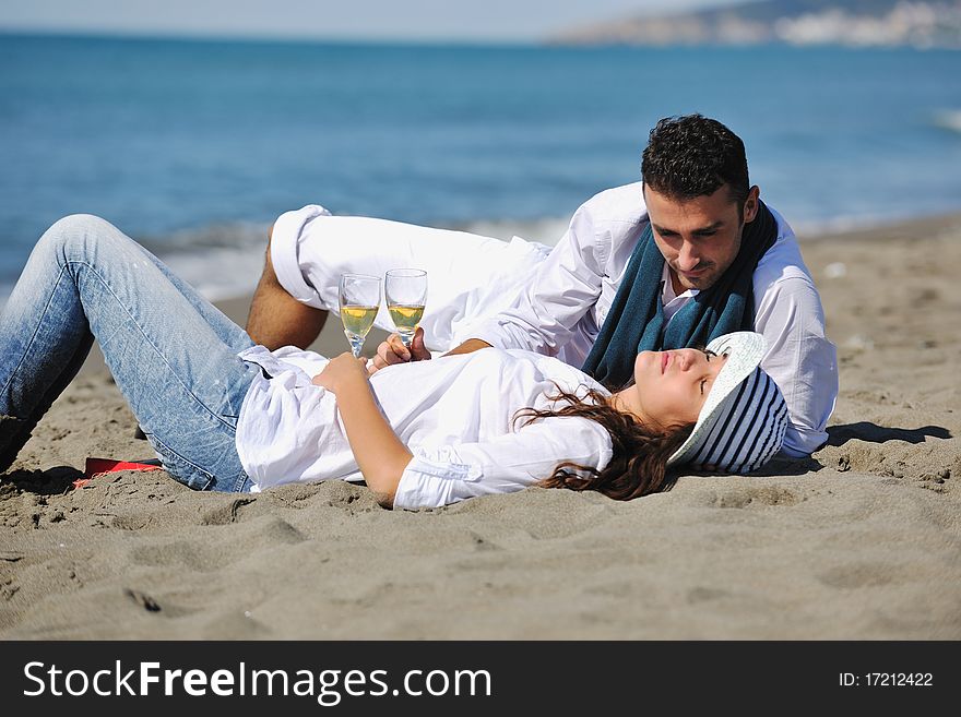 Happy young couple in white clothing  have romantic recreation and   fun at beautiful beach on  vacations. Happy young couple in white clothing  have romantic recreation and   fun at beautiful beach on  vacations