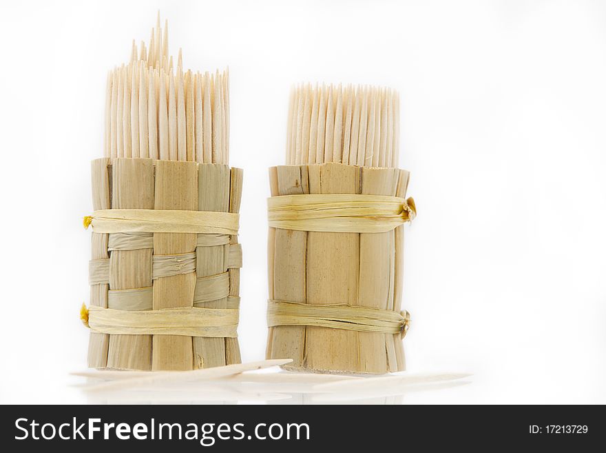 Toothpick - sharp wooden sticks. Two packs. Isolated on White background