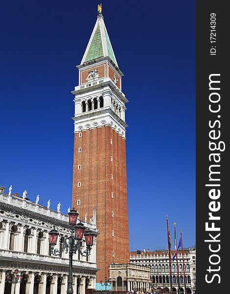 The Saint Mark campanile on Saint Mark square in Venice, Italy. The Saint Mark campanile on Saint Mark square in Venice, Italy
